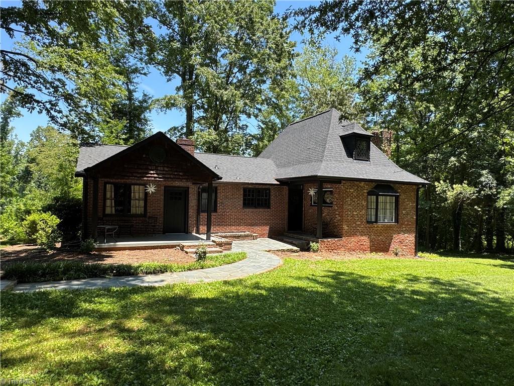 2381 Bethabara Road Winston-Salem, NC 27106 - Photo 2 of 22 when the grass is green and the leaves are on the trees