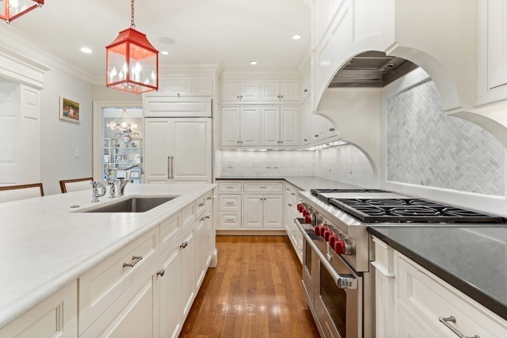 45 Ravine Road Wellesley, MA 02481 - Photo 12 of 42 a kitchen with granite countertop a stove and a sink