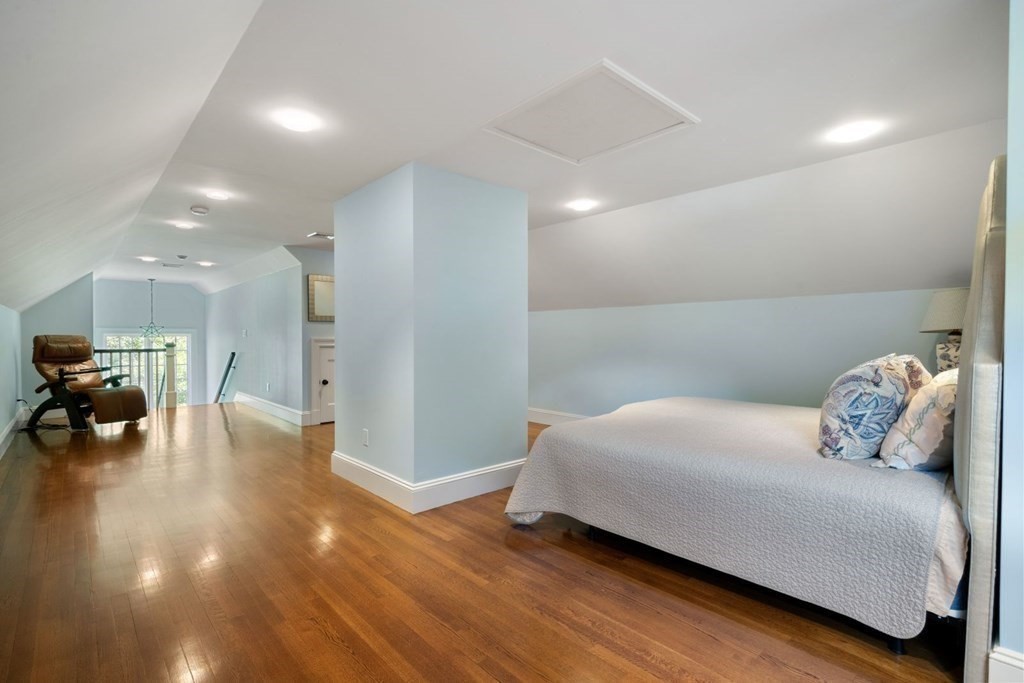 45 Ravine Road Wellesley, MA 02481 - Photo 26 of 42 a bedroom with a bed and a table