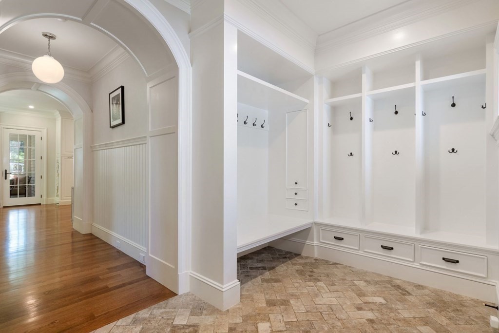 45 Ravine Road Wellesley, MA 02481 - Photo 32 of 42 a view of a hallway with wooden floor