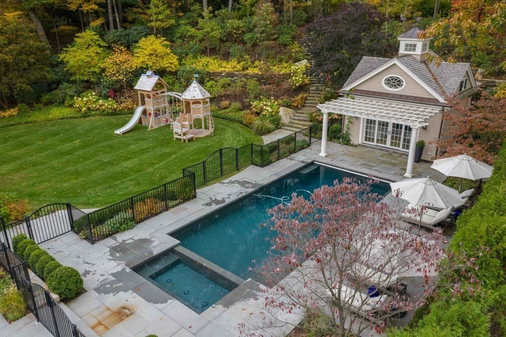 45 Ravine Road Wellesley, MA 02481 - Photo 37 of 42 a front view of a house with garden