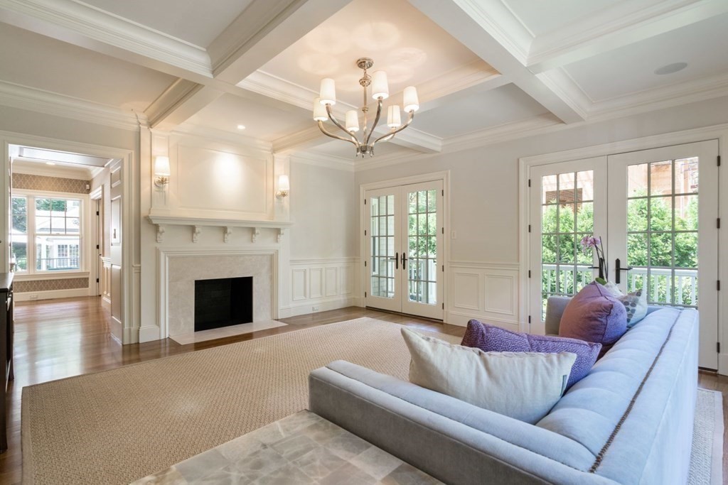 45 Ravine Road Wellesley, MA 02481 - Photo 7 of 42 a living room with furniture a chandelier and a fireplace