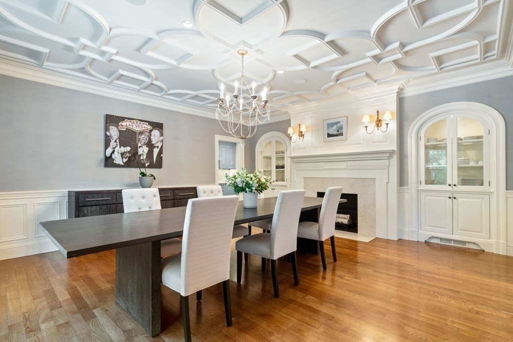 45 Ravine Road Wellesley, MA 02481 - Photo 8 of 42 a view of a dining room with furniture a chandelier and wooden floor