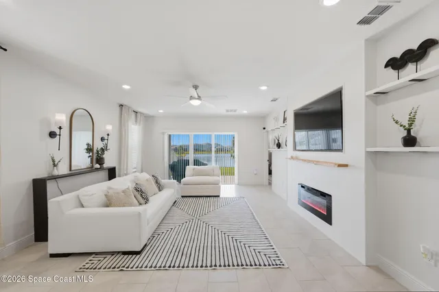 a bedroom with a bed a desk and chair