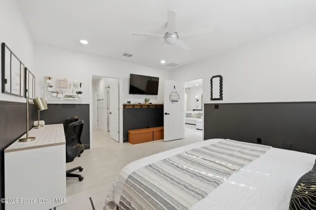 a bed room with a bed and furniture