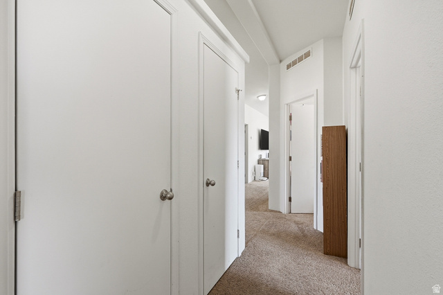 1637 East Midvalley Road Enoch, UT 84721 - Photo 22 of 48 Hallway with light colored carpet