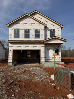 a front view of a house with a porch