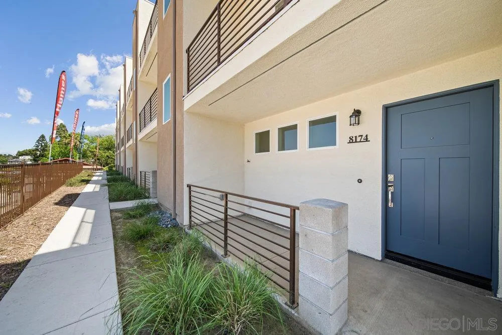 8174 Golden Avenue Lemon Grove, CA 91945 - Photo 2 of 50 a front view of a house with a yard