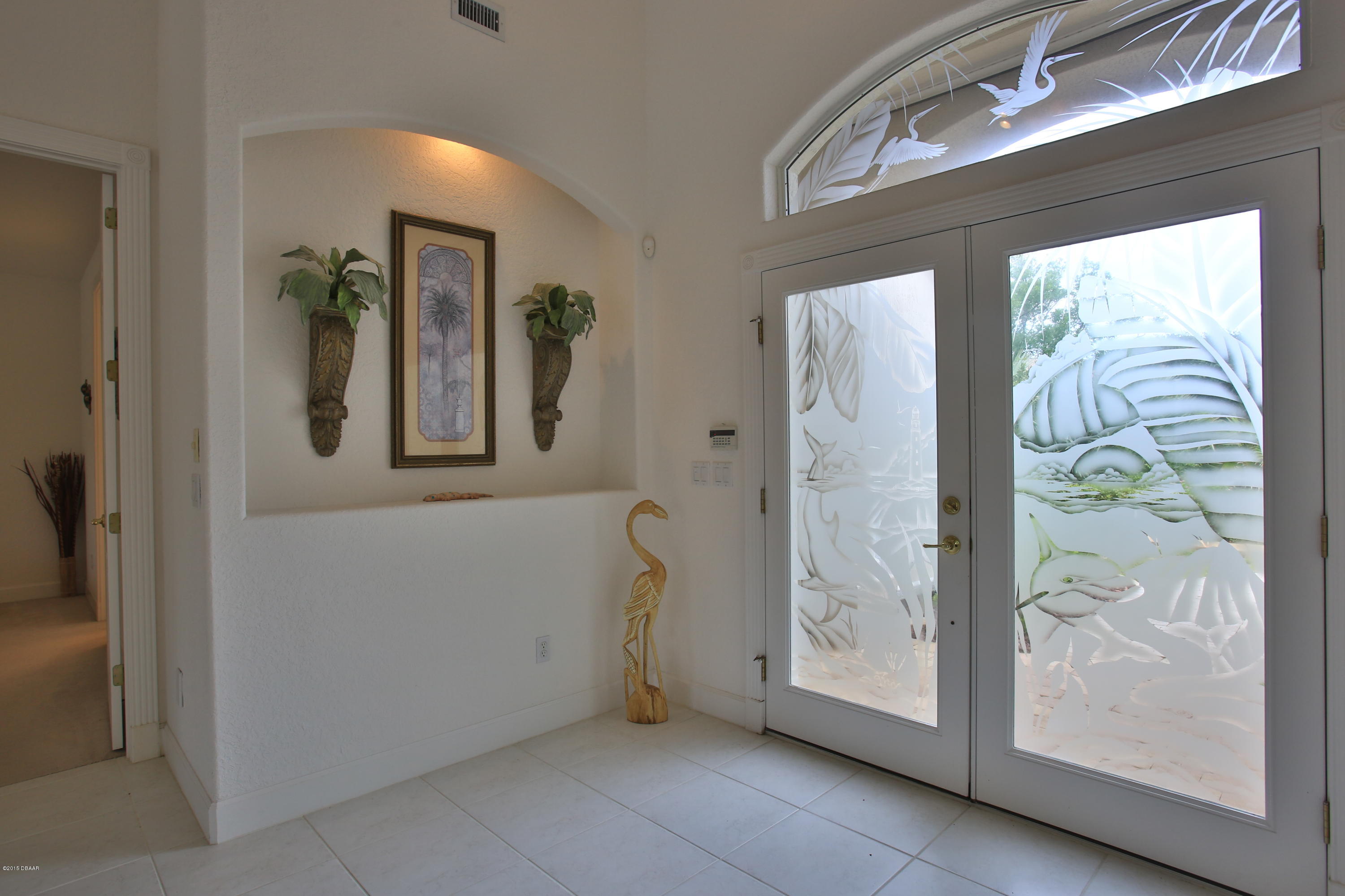 35 Inlet Point Boulevard Ponce Inlet, FL 32127 - Photo 3 of 34 a view of an entryway