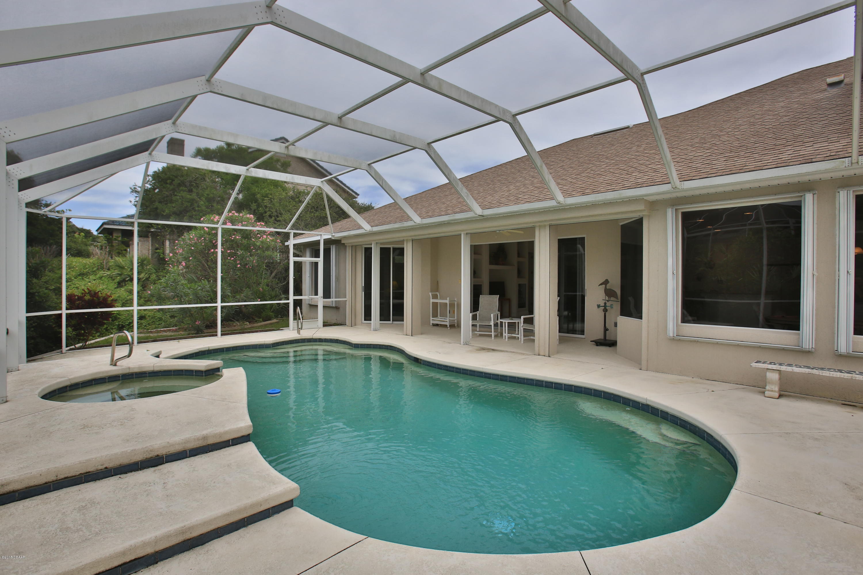 35 Inlet Point Boulevard Ponce Inlet, FL 32127 - Photo 30 of 34 a view of a house with swimming pool