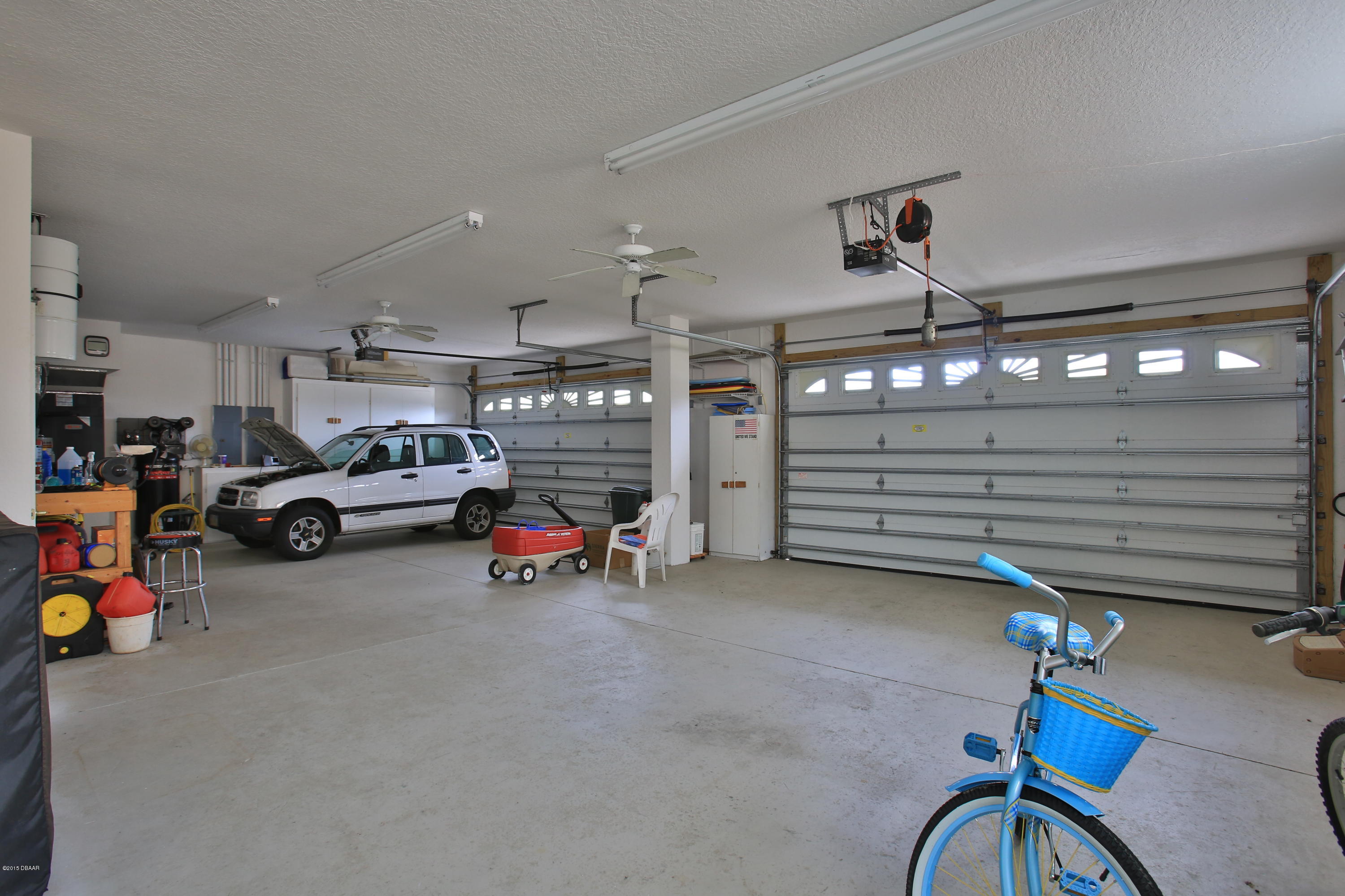 35 Inlet Point Boulevard Ponce Inlet, FL 32127 - Photo 31 of 34 a view of parking garage with cars