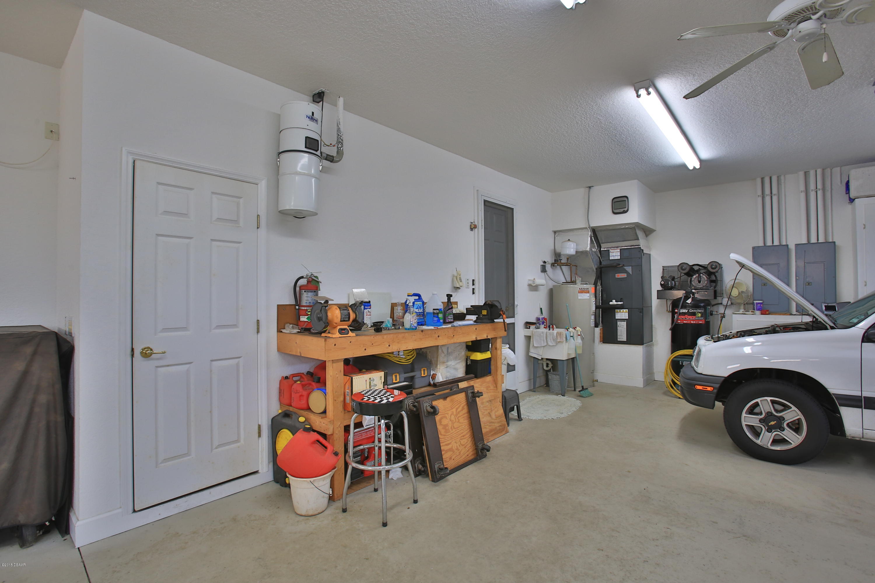 35 Inlet Point Boulevard Ponce Inlet, FL 32127 - Photo 32 of 34 a view of storage and utility room