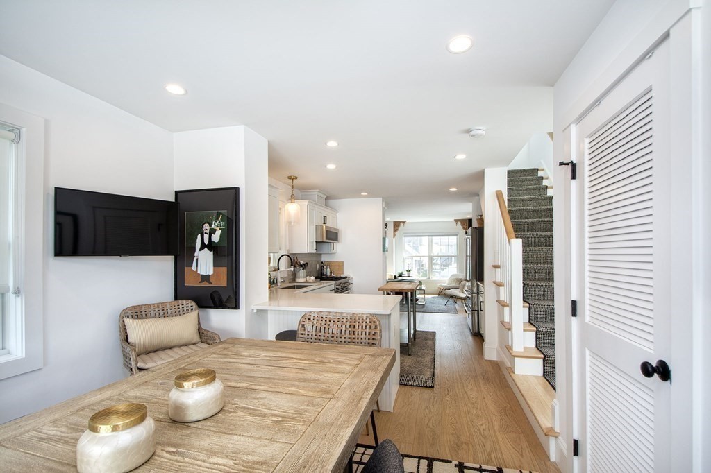 83 Glades Road Scituate, MA 02066 - Photo 11 of 37 a living room with furniture and a flat screen tv