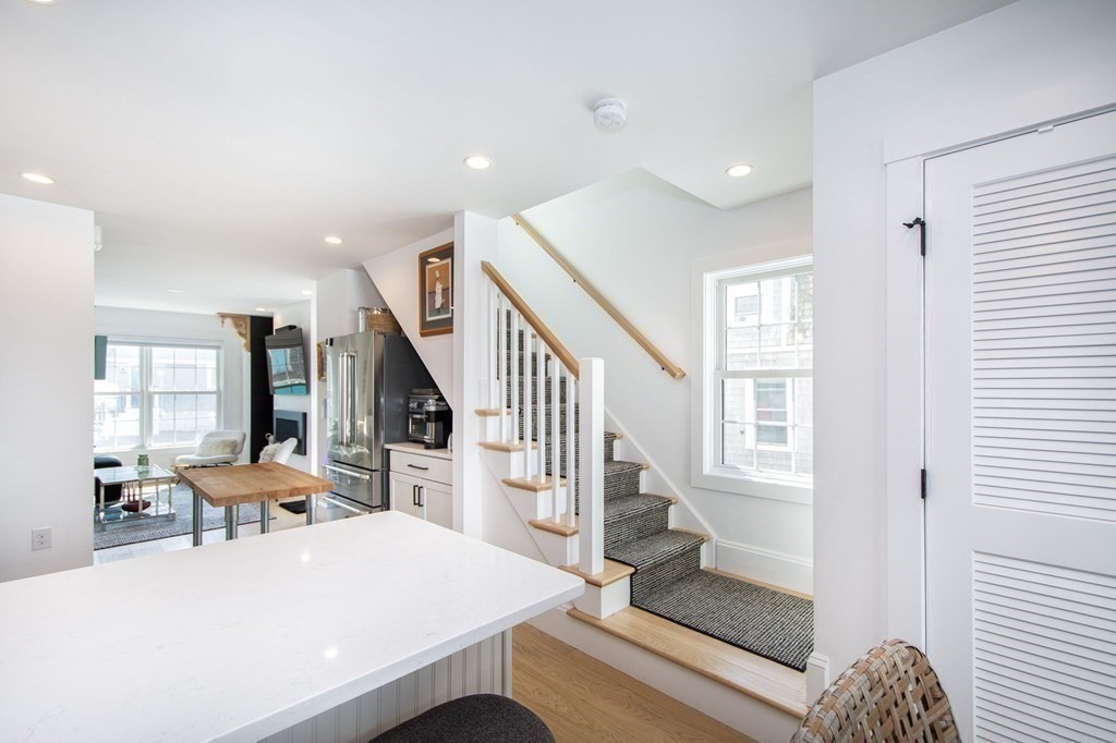 83 Glades Road Scituate, MA 02066 - Photo 12 of 37 a living room with furniture and a table