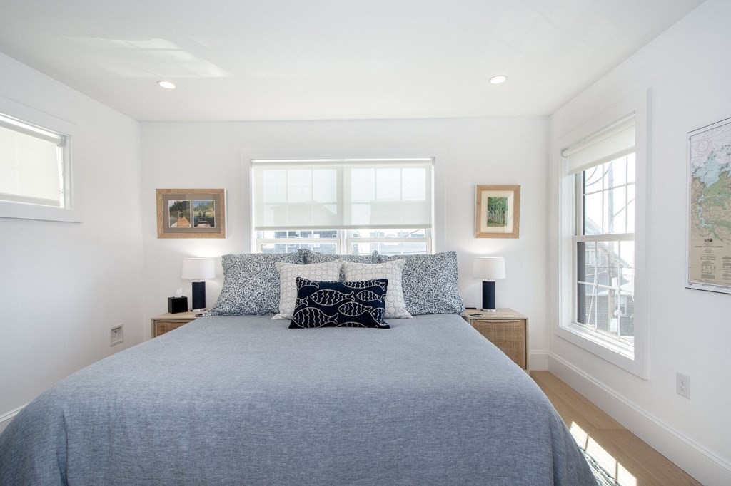 83 Glades Road Scituate, MA 02066 - Photo 13 of 37 a bed room with a bed and a window