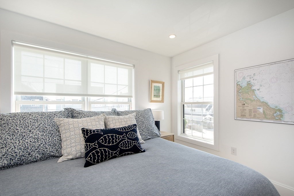 83 Glades Road Scituate, MA 02066 - Photo 14 of 37 a living room with furniture and a large window
