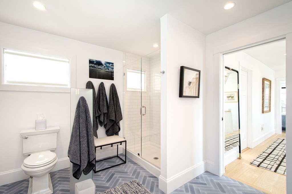 83 Glades Road Scituate, MA 02066 - Photo 16 of 37 a bathroom with a toilet and a tub