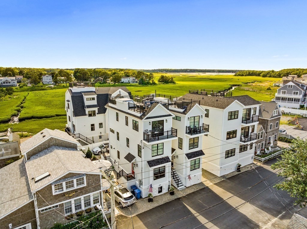 83 Glades Road Scituate, MA 02066 - Photo 32 of 37 aerial view of a multi story building