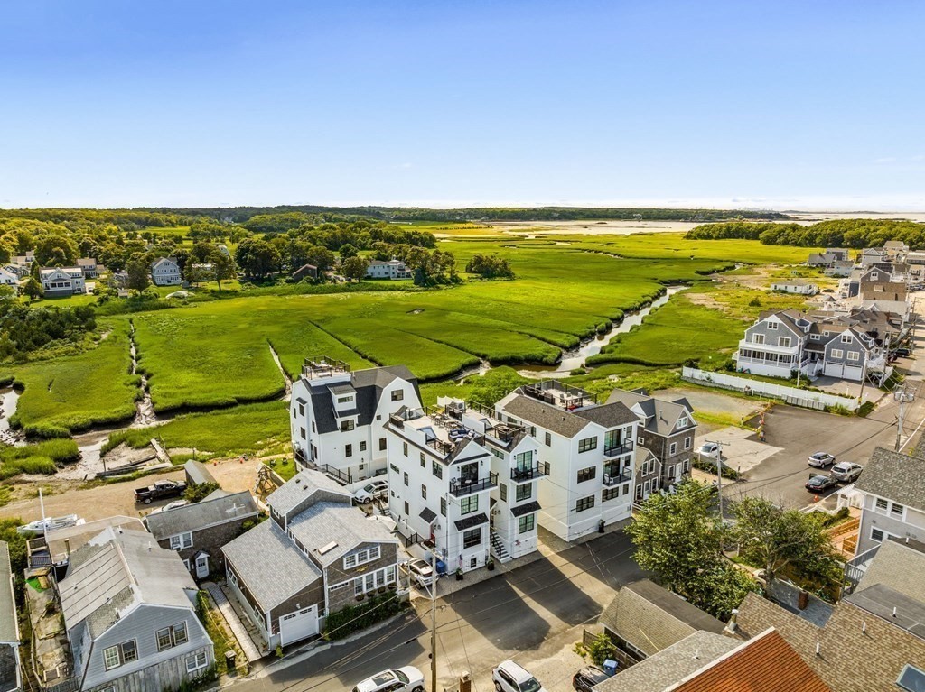 83 Glades Road Scituate, MA 02066 - Photo 33 of 37 an aerial view of a city with lawn chairs