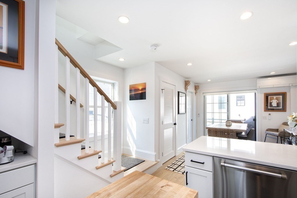 83 Glades Road Scituate, MA 02066 - Photo 9 of 37 a room with a bed and a dresser