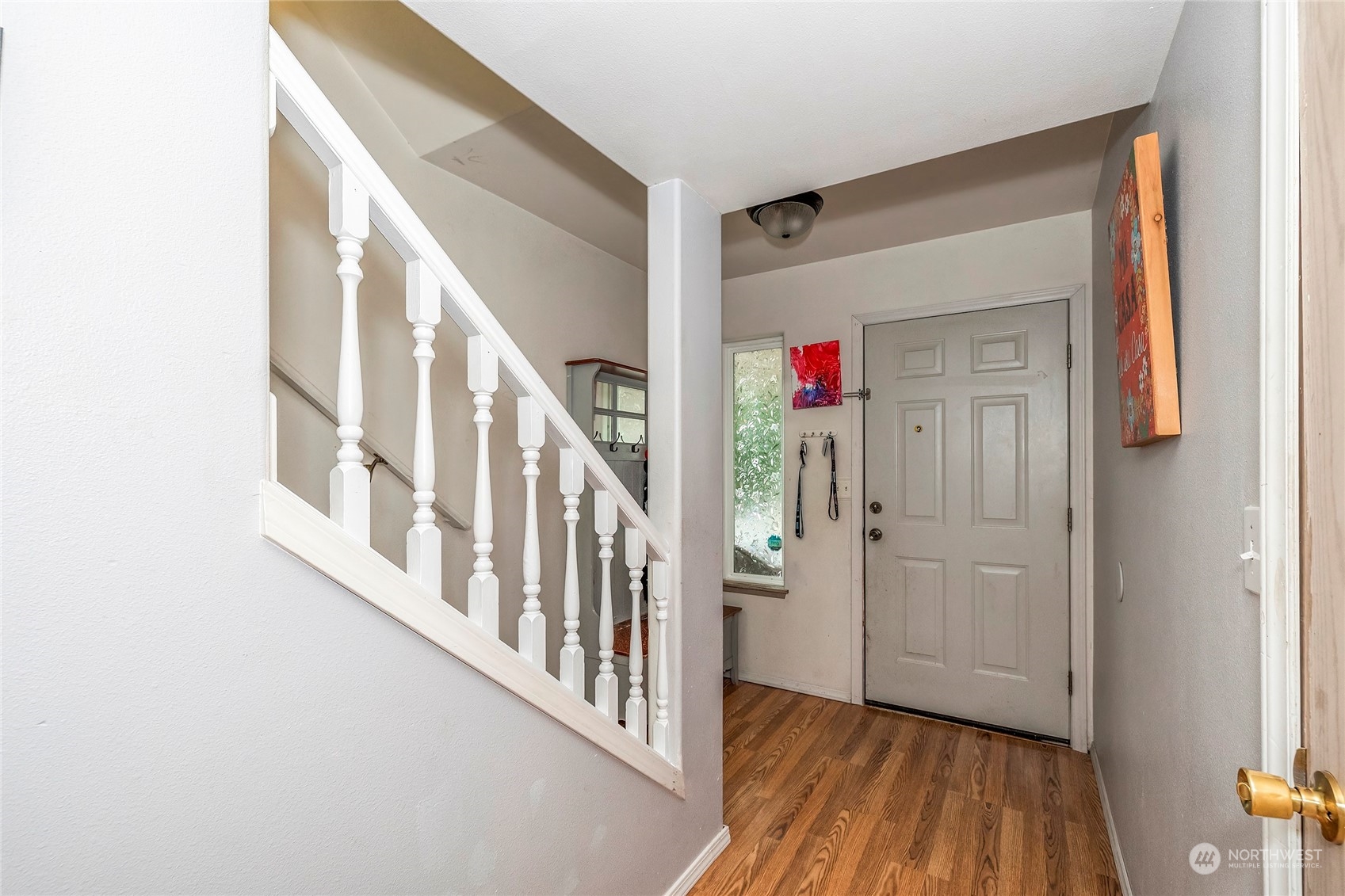 3992 Broadmoor Loop Bremerton, WA 98310 - Photo 13 of 34 a view of an entryway with wooden floor