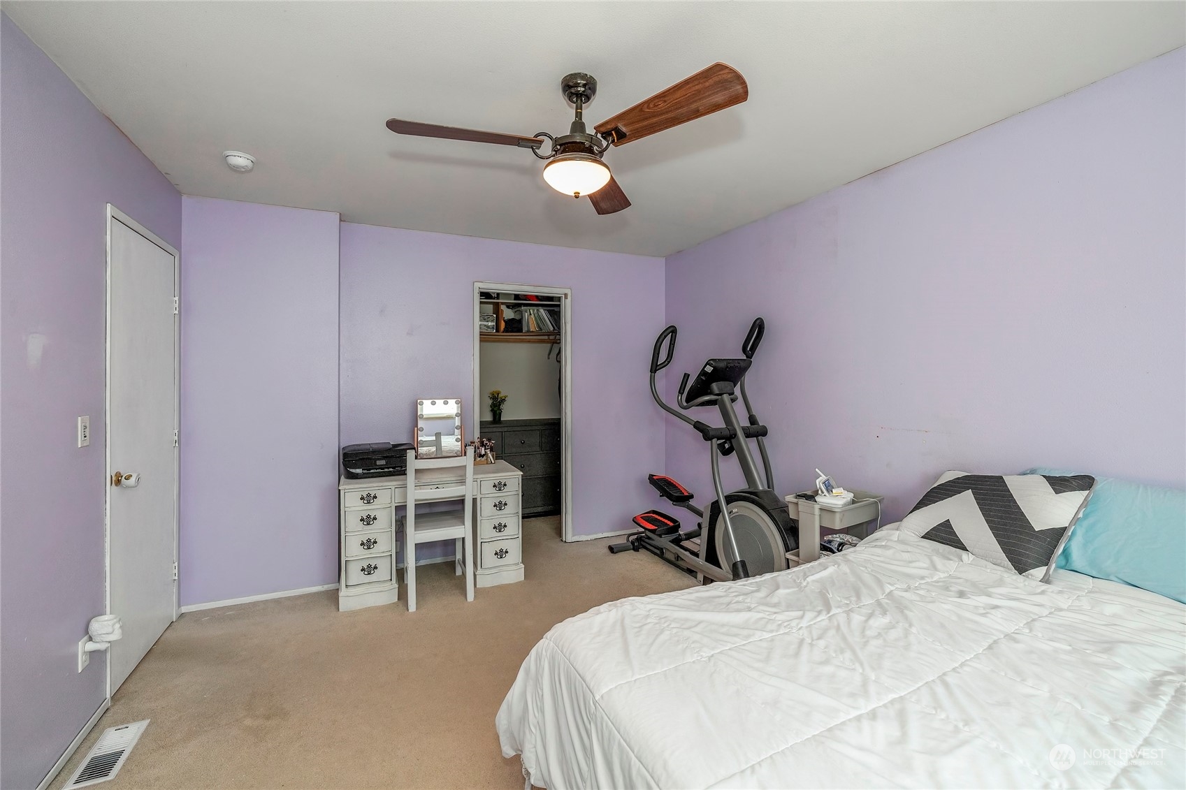 3992 Broadmoor Loop Bremerton, WA 98310 - Photo 14 of 34 a bed room with a bed and a ceiling fan