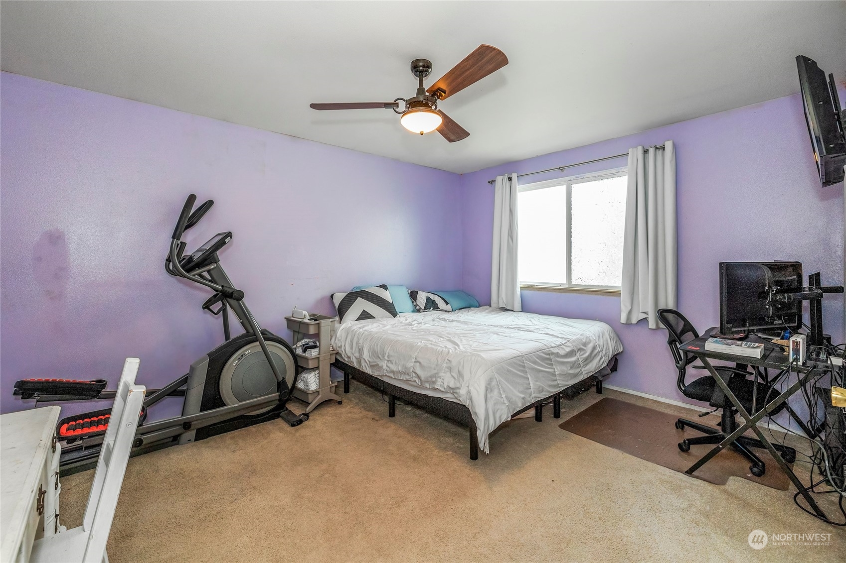 3992 Broadmoor Loop Bremerton, WA 98310 - Photo 15 of 34 a bedroom with a bed and a desk