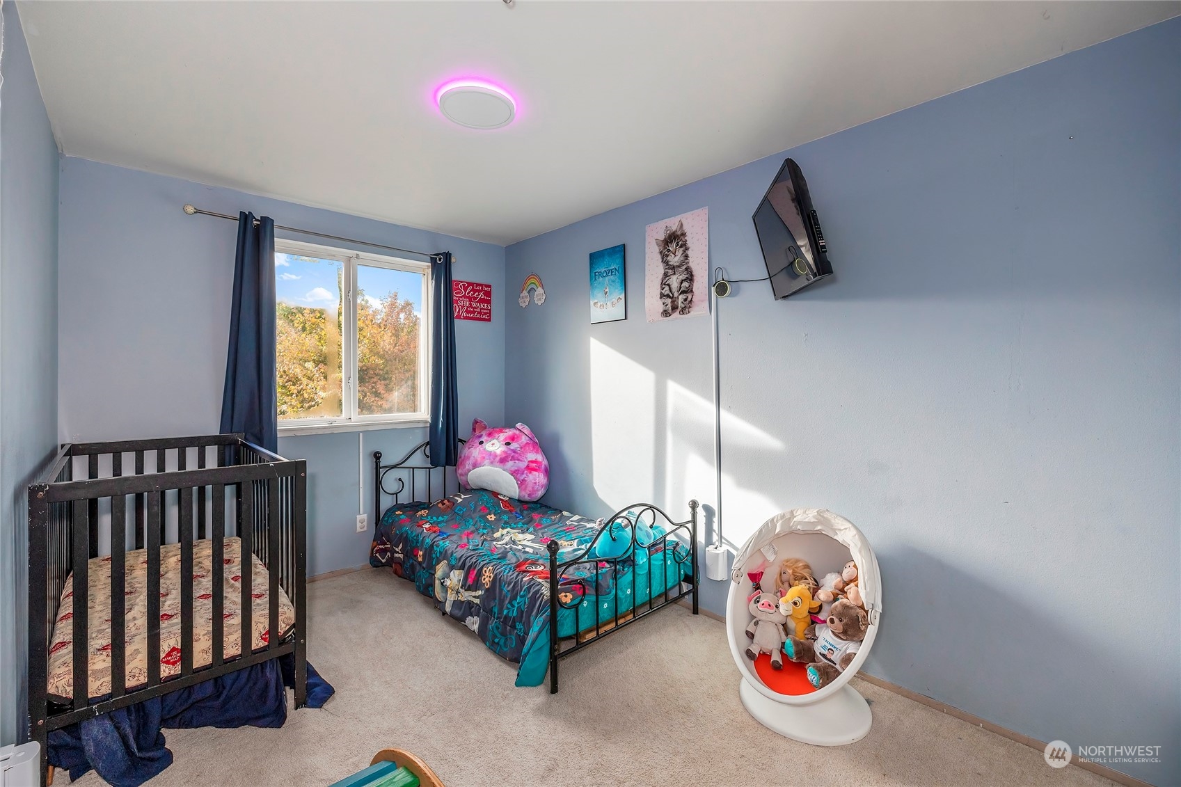 3992 Broadmoor Loop Bremerton, WA 98310 - Photo 21 of 34 a bedroom with furniture and a window