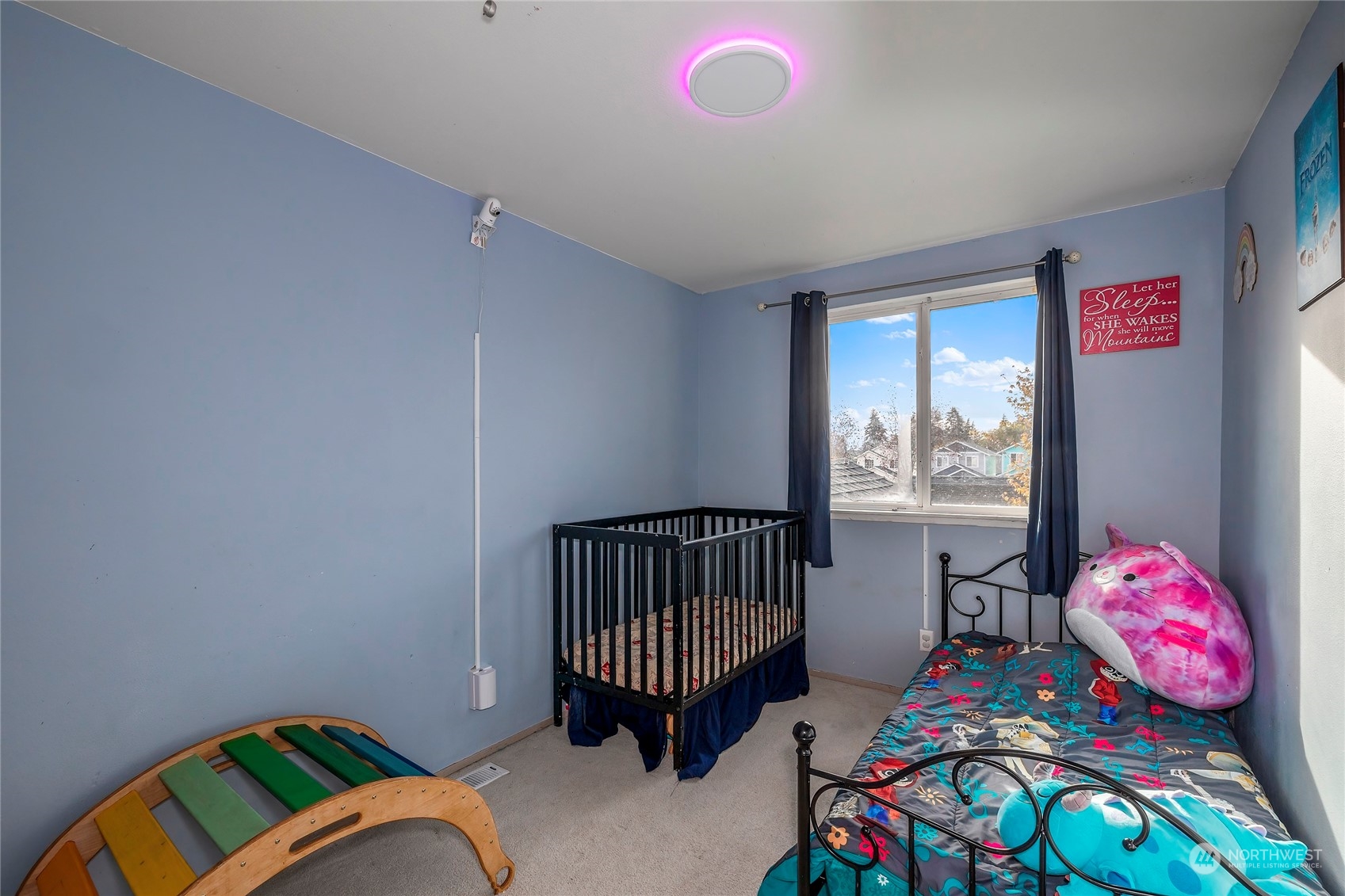 3992 Broadmoor Loop Bremerton, WA 98310 - Photo 22 of 34 a bedroom with a bed and a window