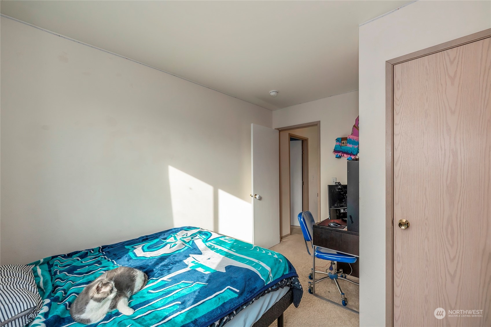3992 Broadmoor Loop Bremerton, WA 98310 - Photo 24 of 34 a bedroom with a bed and a table in it