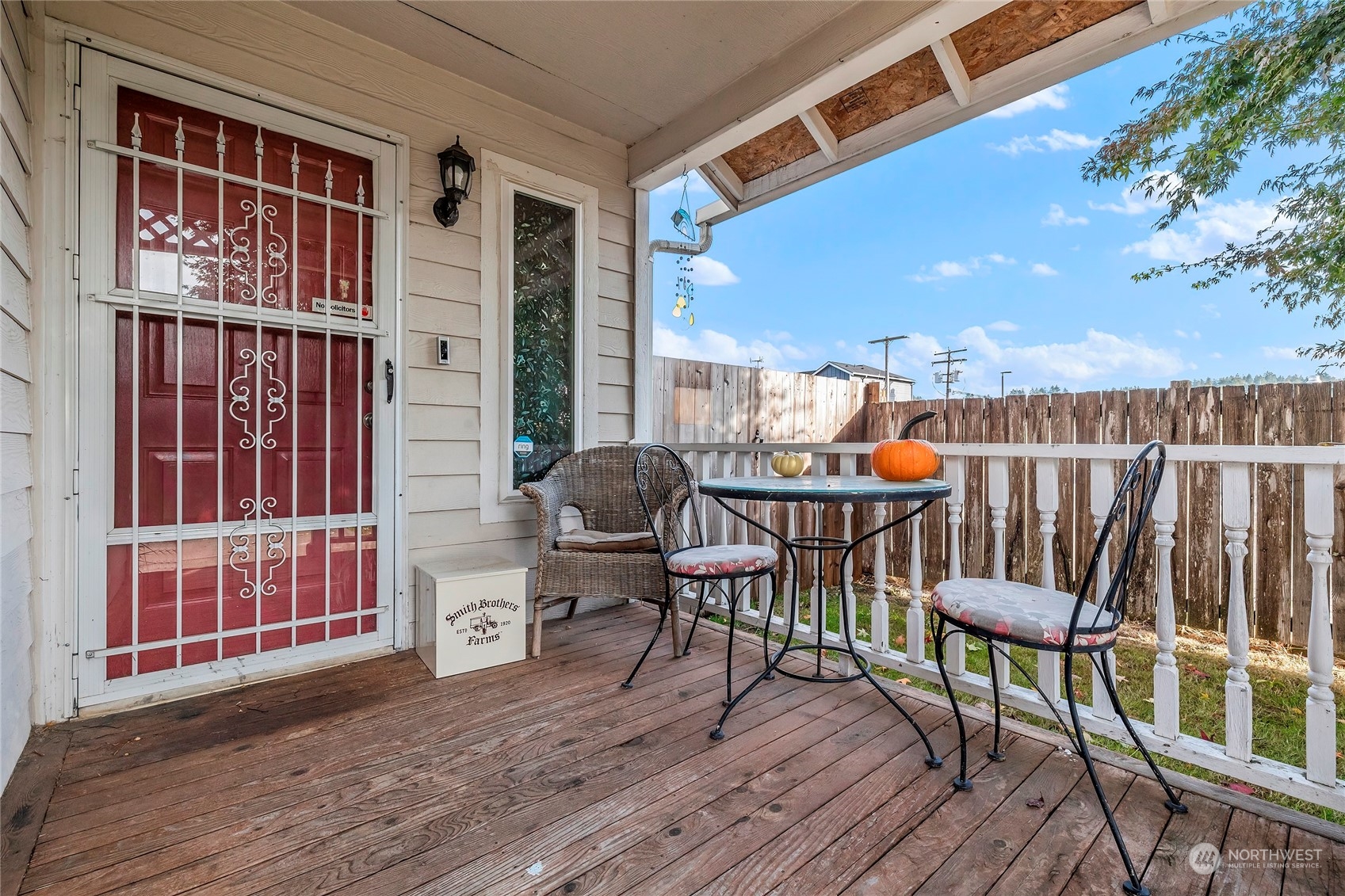3992 Broadmoor Loop Bremerton, WA 98310 - Photo 3 of 34 a balcony with chairs and wooden floor