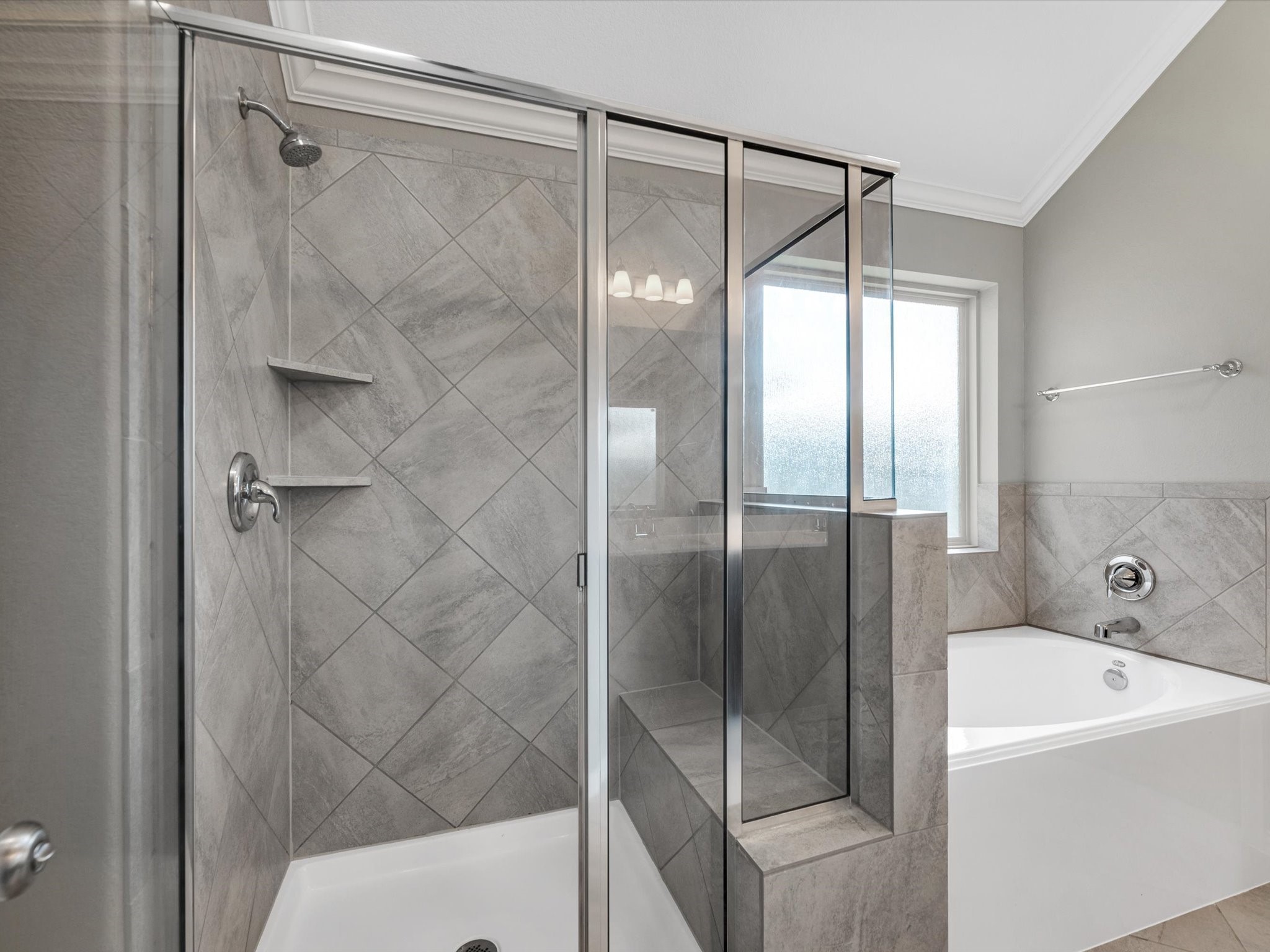 31120 Aspen Gate Trail Spring, TX 77386 - Photo 17 of 33 a bathroom with a bathtub and a shower