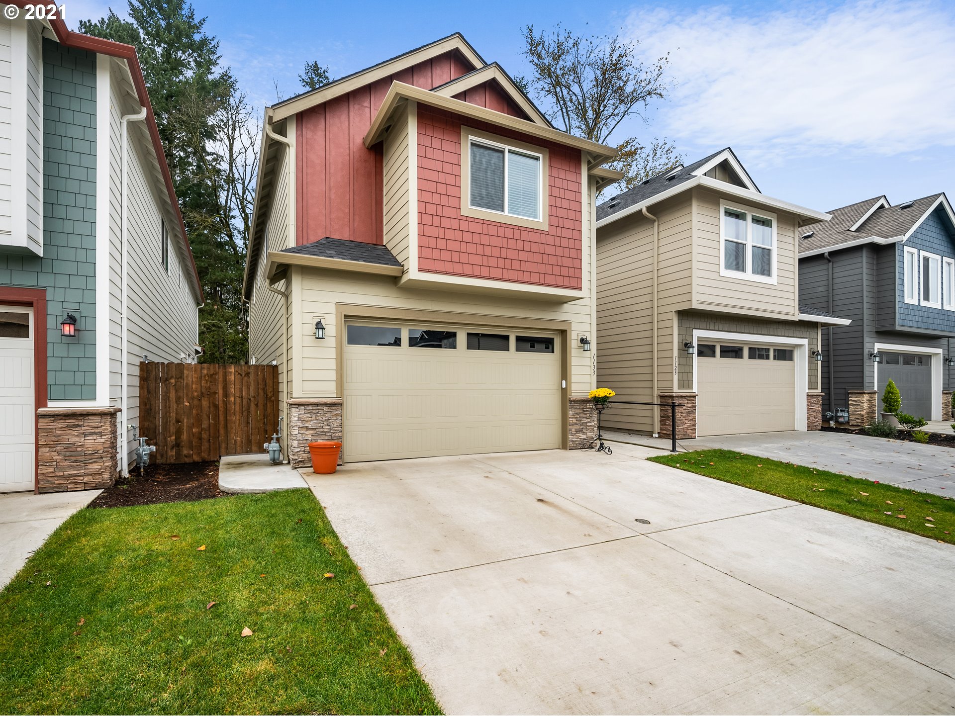 1133 South Union Place Ridgefield, WA 98642 - Photo 2 of 27 a view of a house with a yard and pathway
