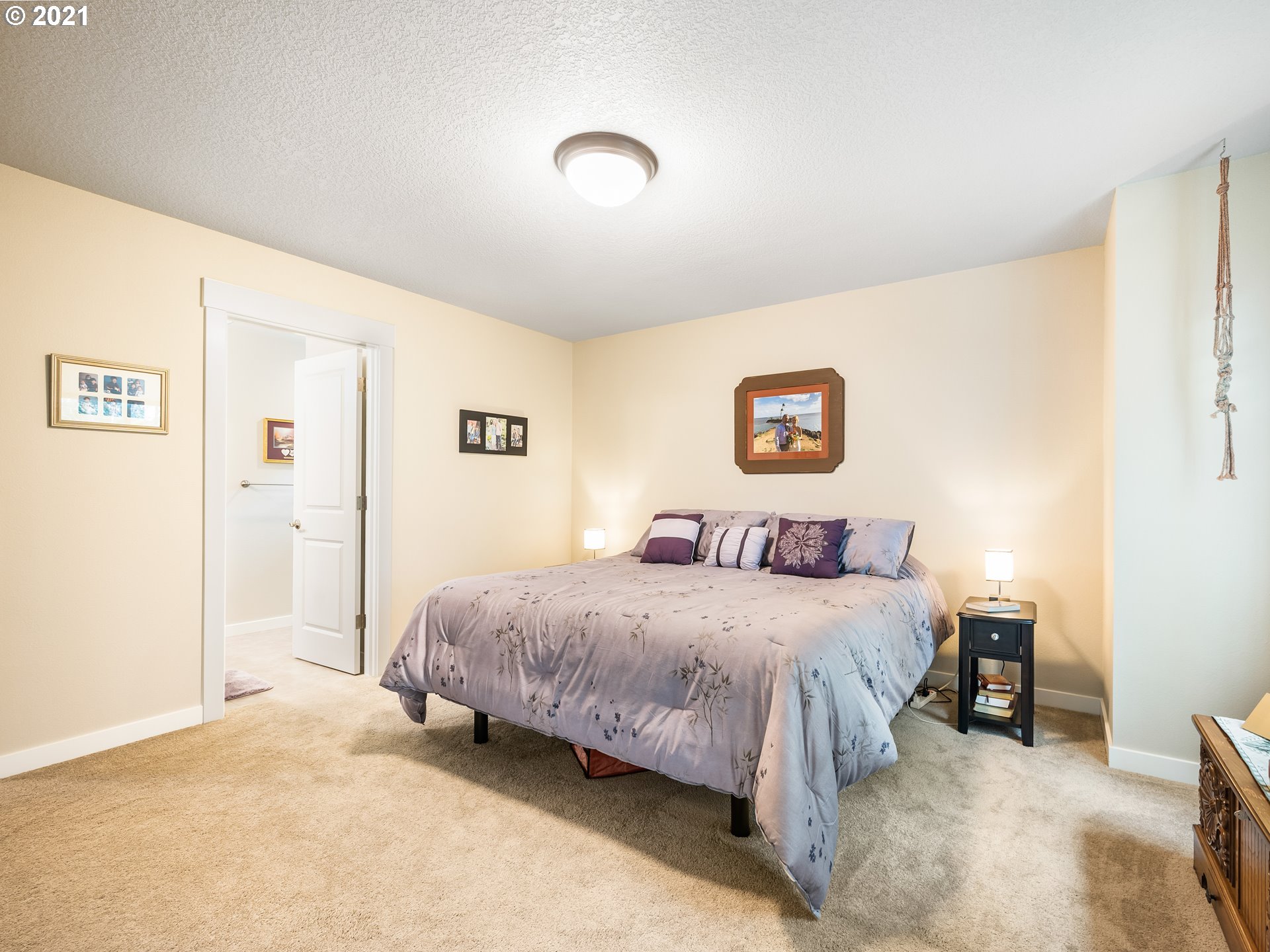 1133 South Union Place Ridgefield, WA 98642 - Photo 13 of 27 a bedroom with a bed and a cabinets
