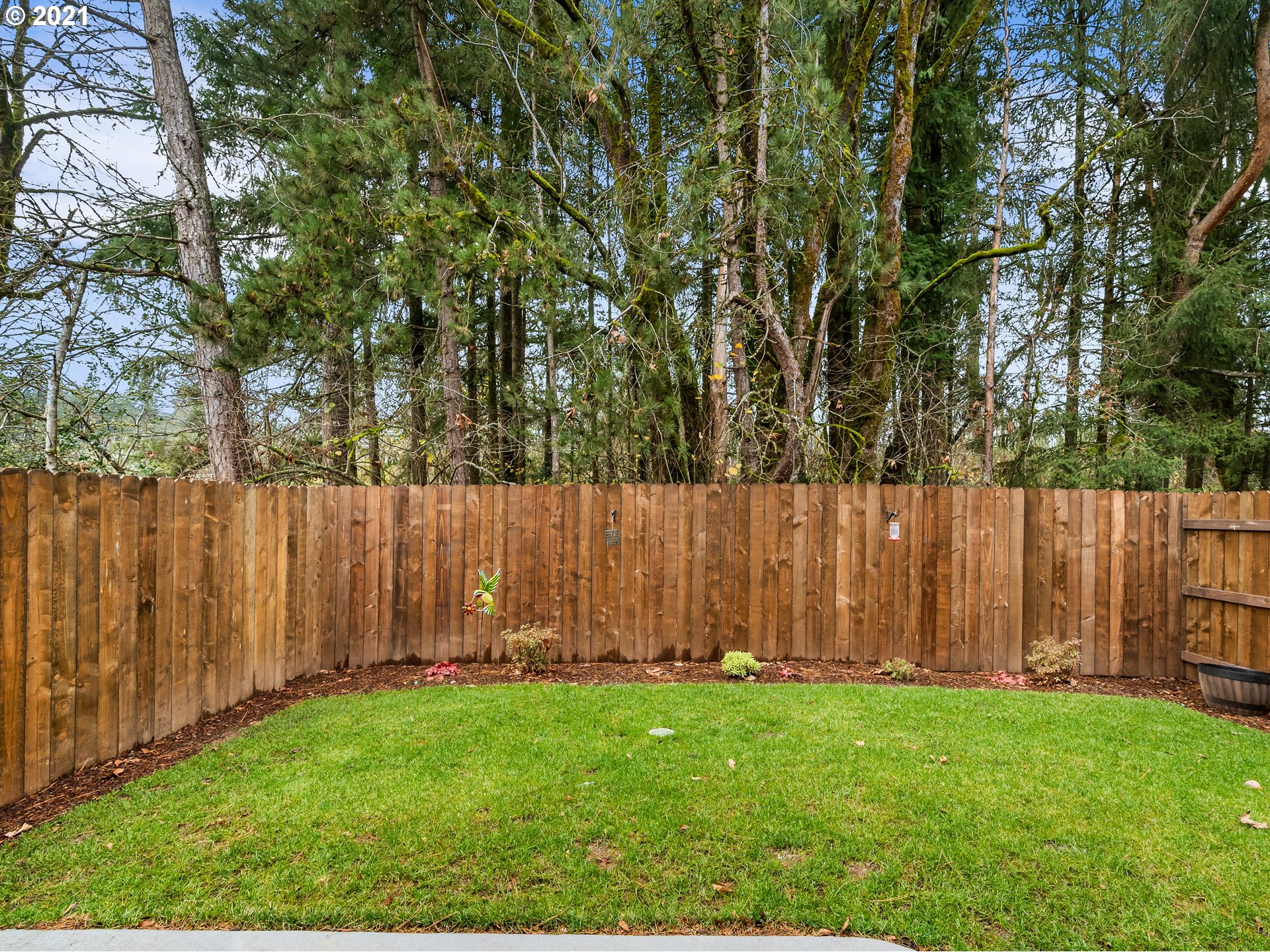 1133 South Union Place Ridgefield, WA 98642 - Photo 27 of 27 a view of a backyard with wooden fence