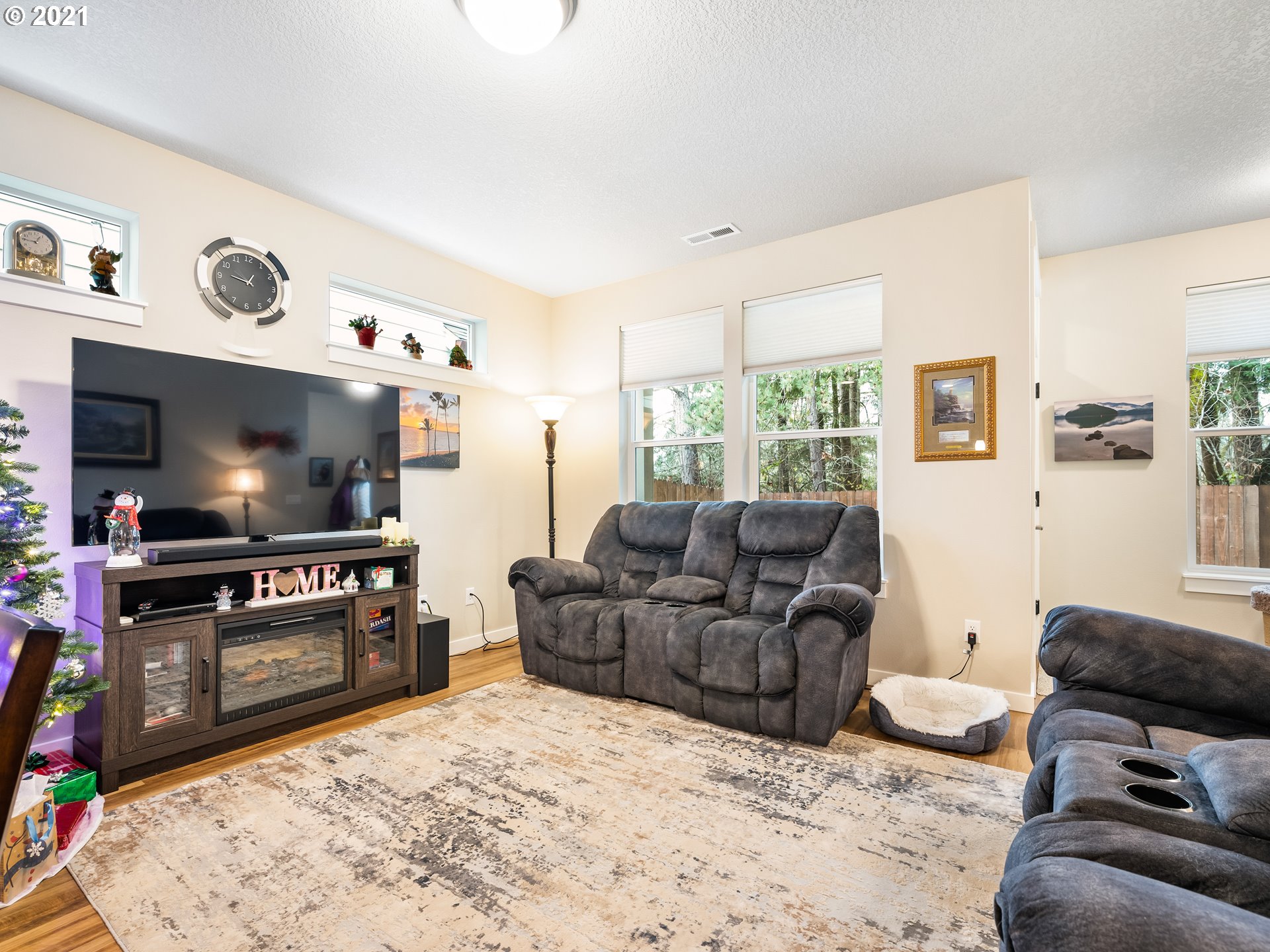 1133 South Union Place Ridgefield, WA 98642 - Photo 10 of 27 a living room with furniture and a flat screen tv