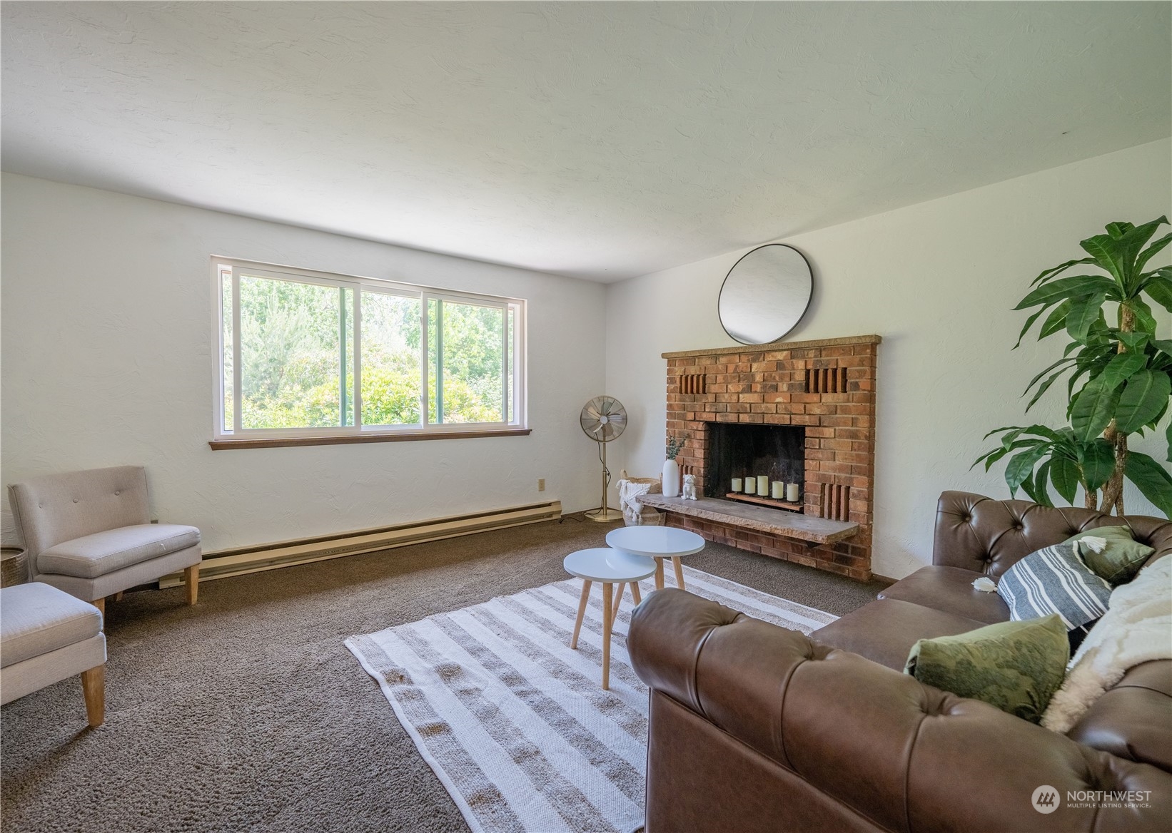 16935 Sargent Road Southwest Rochester, WA 98579 - Photo 6 of 18 a living room with furniture fireplace and window