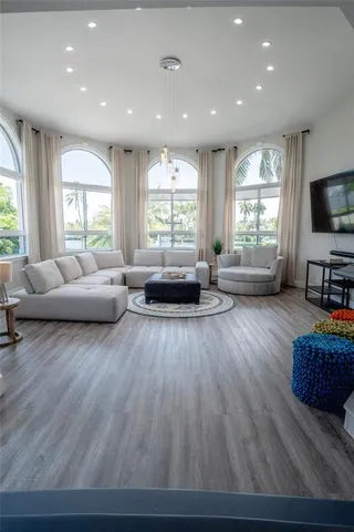 a living room with large window