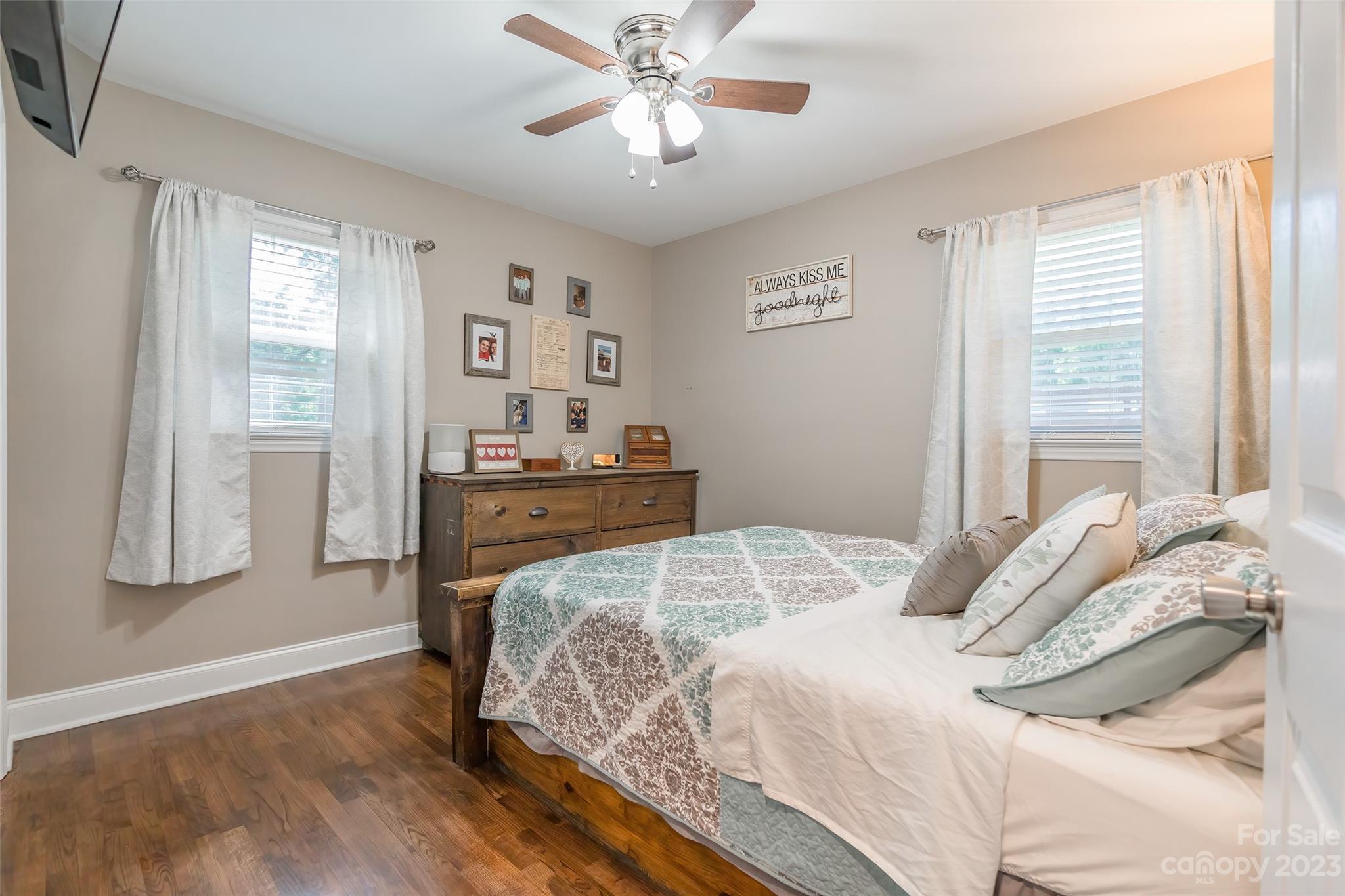 1514 Shiloh Unity Road Lancaster, SC 29720 - Photo 15 of 26 a bedroom with a bed and wooden floor