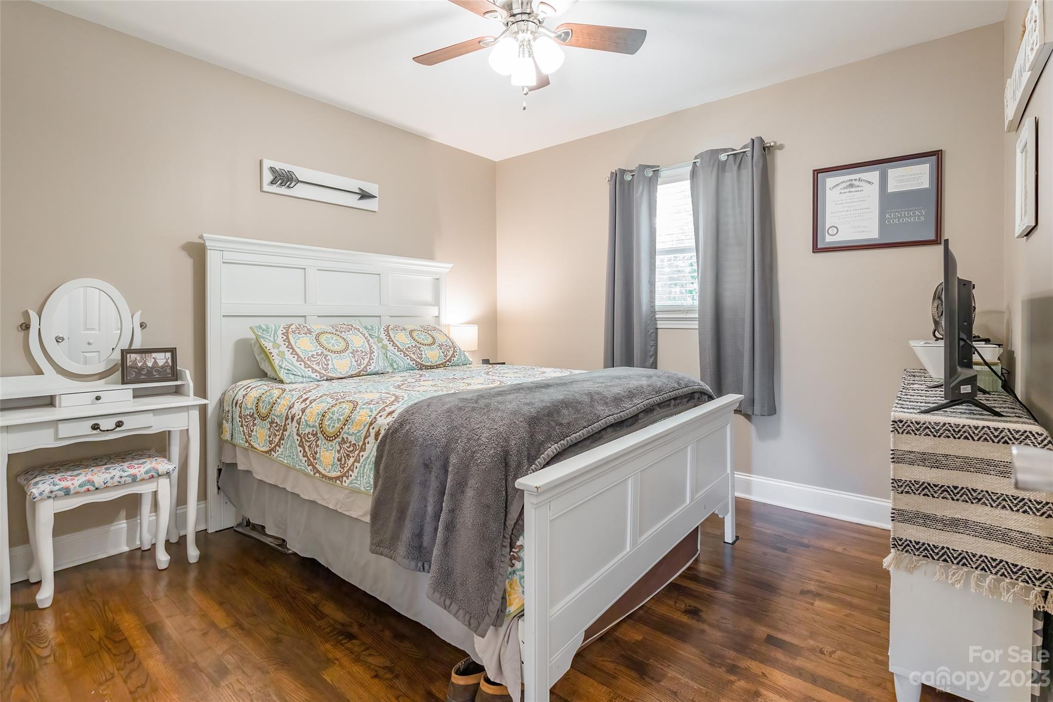 1514 Shiloh Unity Road Lancaster, SC 29720 - Photo 17 of 26 a bedroom with a bed and wooden floor