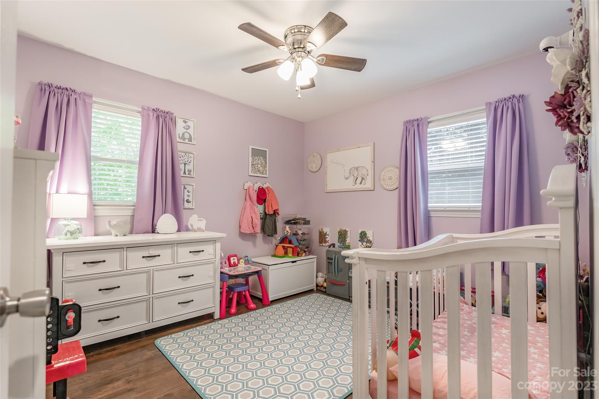 1514 Shiloh Unity Road Lancaster, SC 29720 - Photo 19 of 26 a bed room with a bed and a baby crib