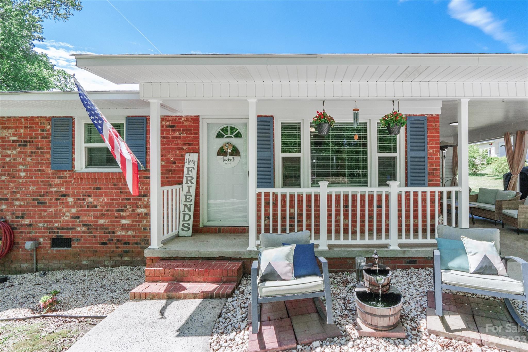 1514 Shiloh Unity Road Lancaster, SC 29720 - Photo 2 of 26 a view of a patio with a dining table and chairs
