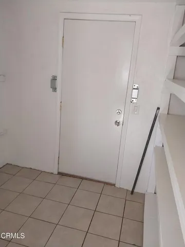 a kitchen with granite countertop cabinets and steel stainless steel appliances