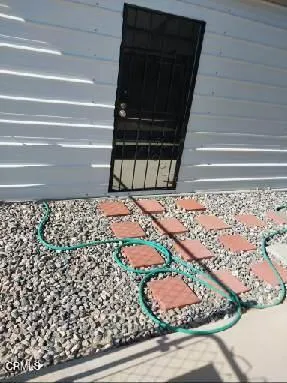 a view of balcony with wooden floor