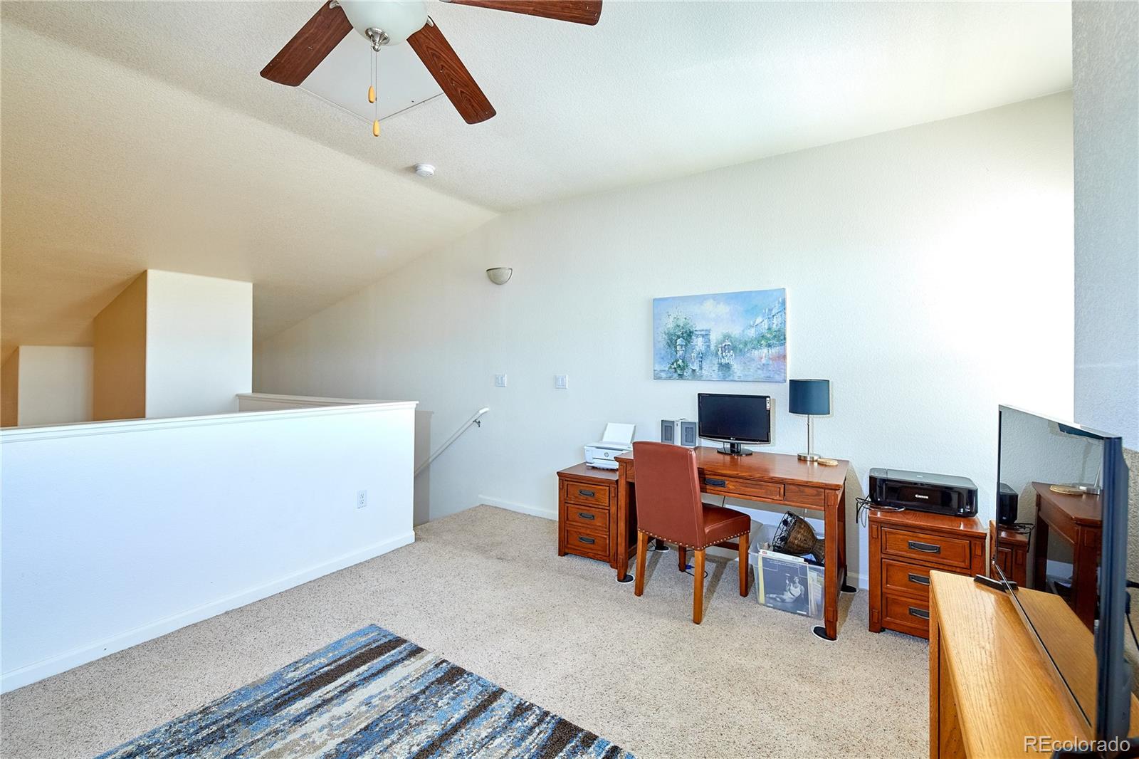 5800 Tower Road, Unit 610 Denver, CO 80249 - Photo 16 of 25 a room with furniture and air hockey table