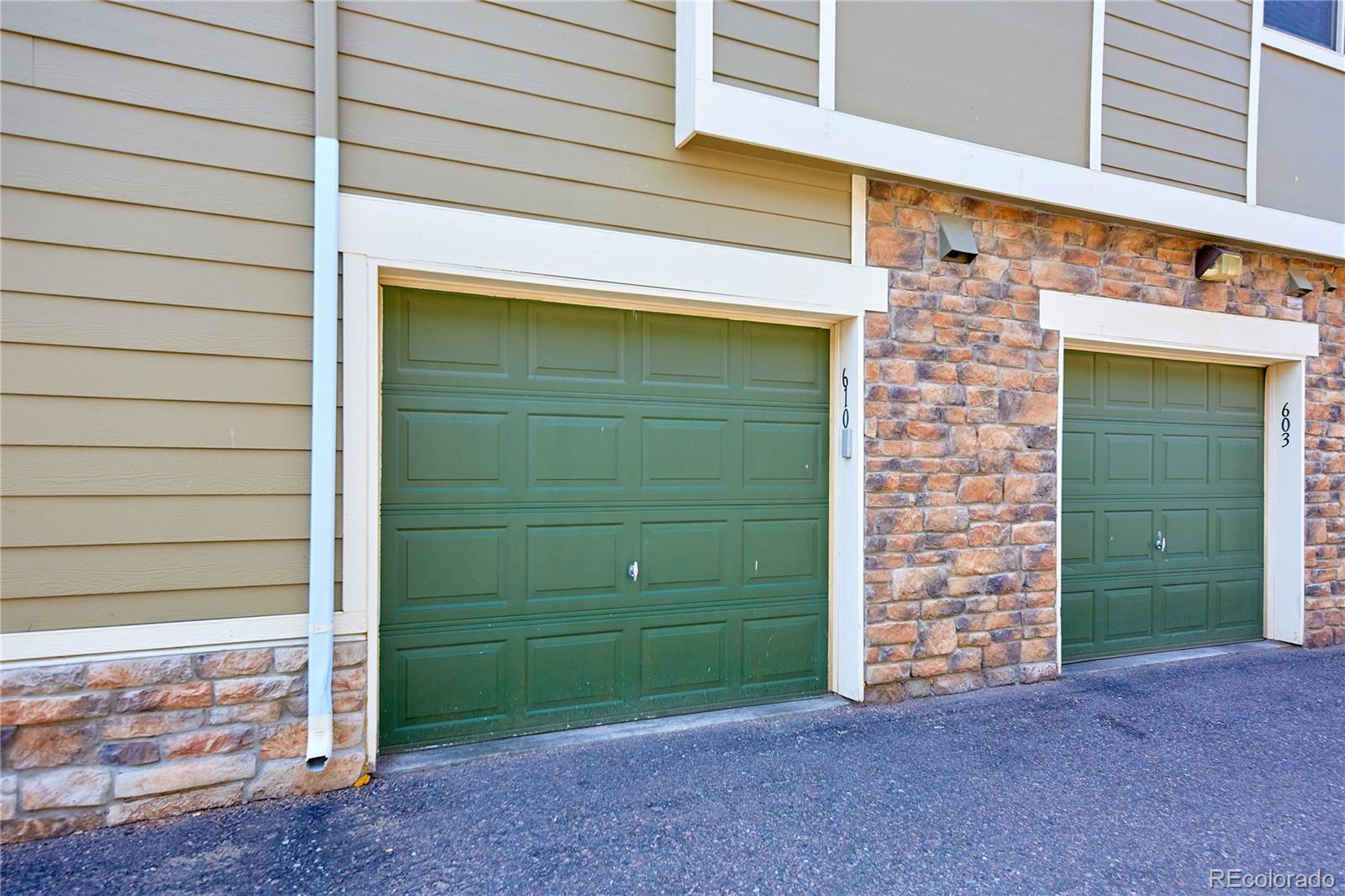 5800 Tower Road, Unit 610 Denver, CO 80249 - Photo 21 of 25 a view of outdoor space garage and window
