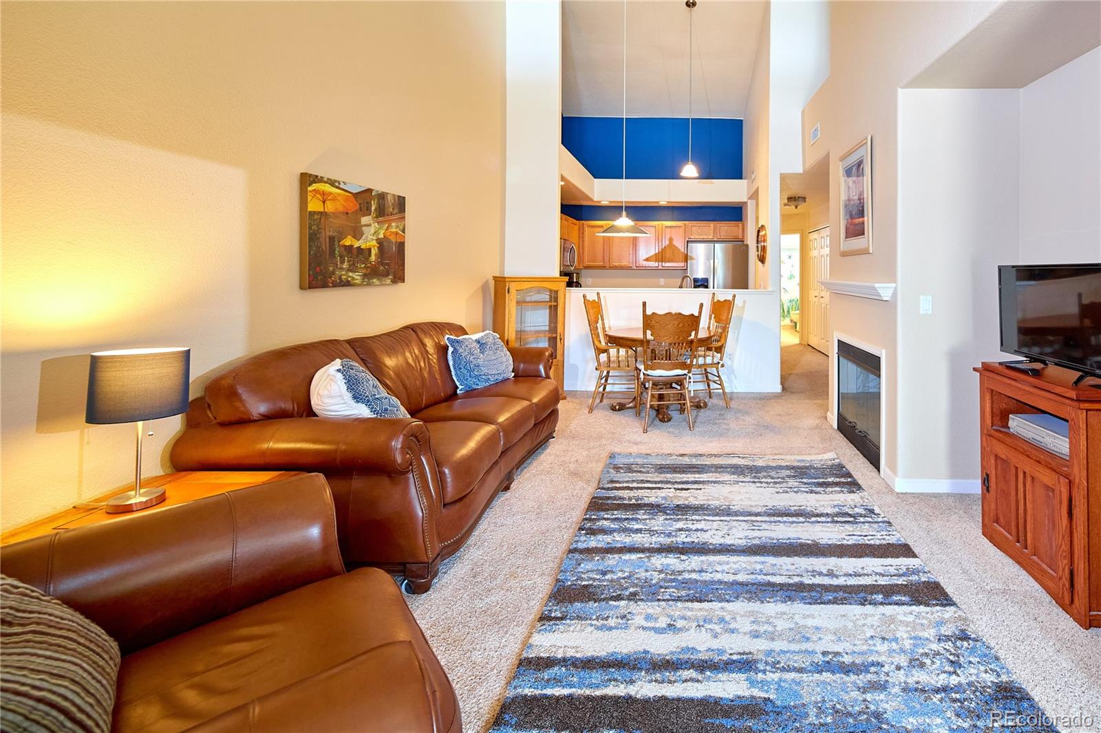 5800 Tower Road, Unit 610 Denver, CO 80249 - Photo 3 of 25 a view of a living room and a couch