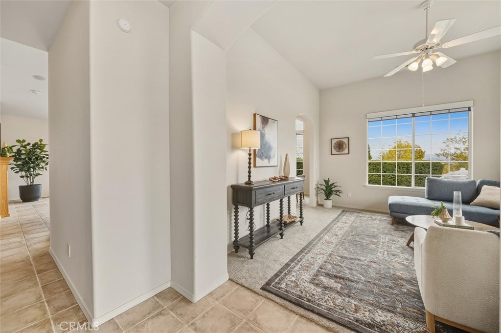 1608 Via Flora Paso Robles, CA 93446 - Photo 6 of 57 a living room with furniture a table and a potted plant