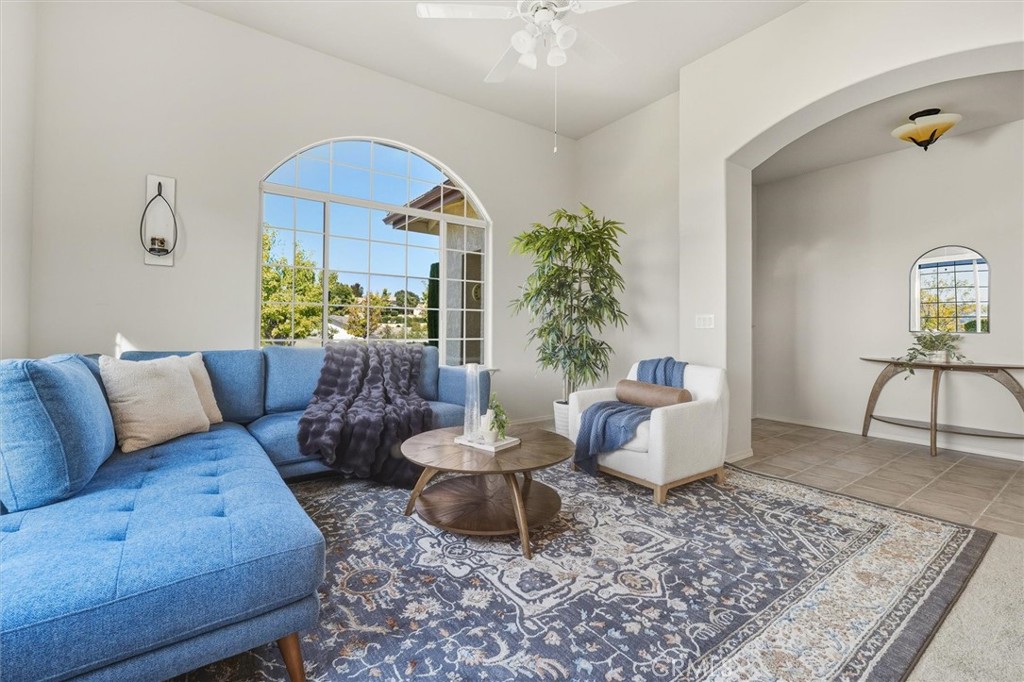 1608 Via Flora Paso Robles, CA 93446 - Photo 7 of 57 a living room with furniture and a rug