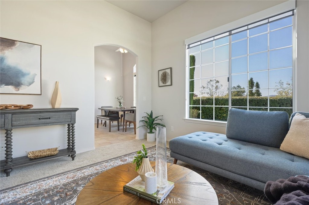 1608 Via Flora Paso Robles, CA 93446 - Photo 9 of 57 a living room with furniture and a fireplace